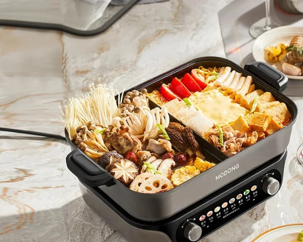 Delt elektrisk hotpot med non-stick innerskål, 8L kapasitet